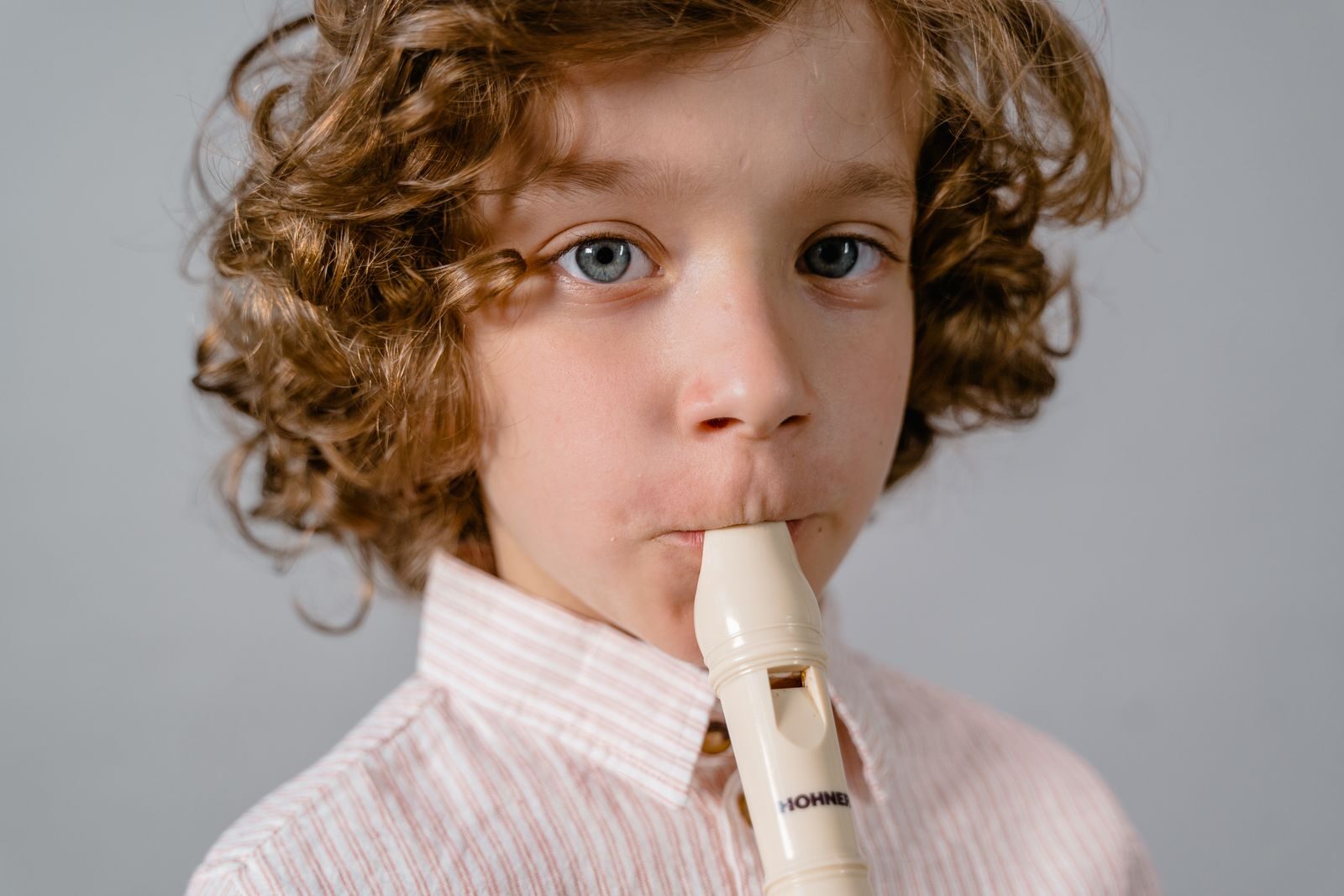 Young student playing flute