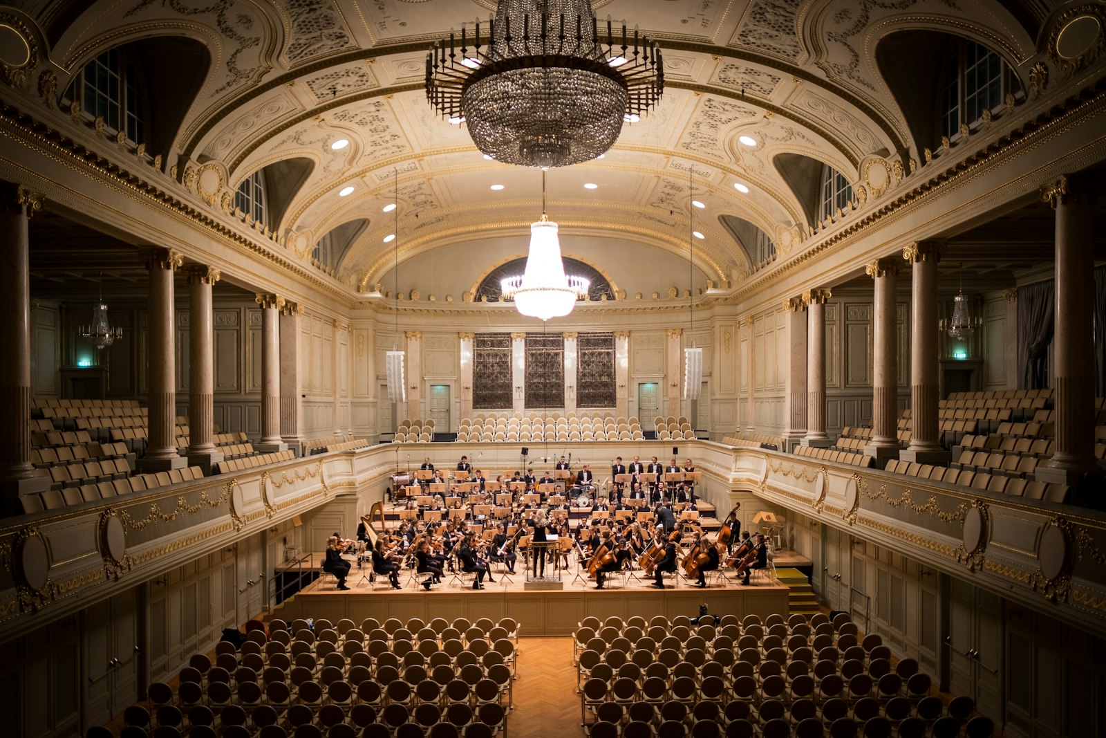 Orchestra performing in a concert hall
