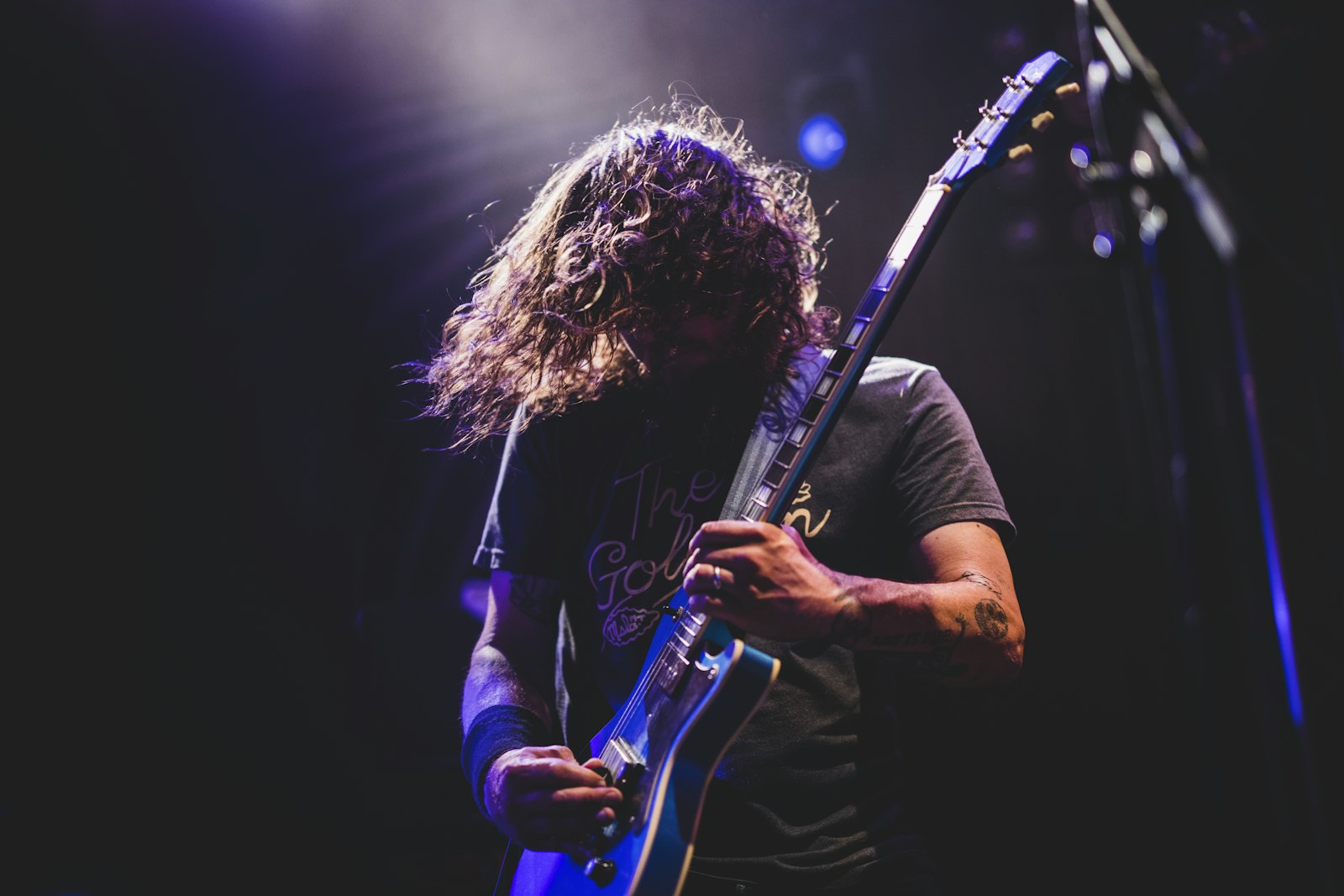 Electric guitarist performing on stage